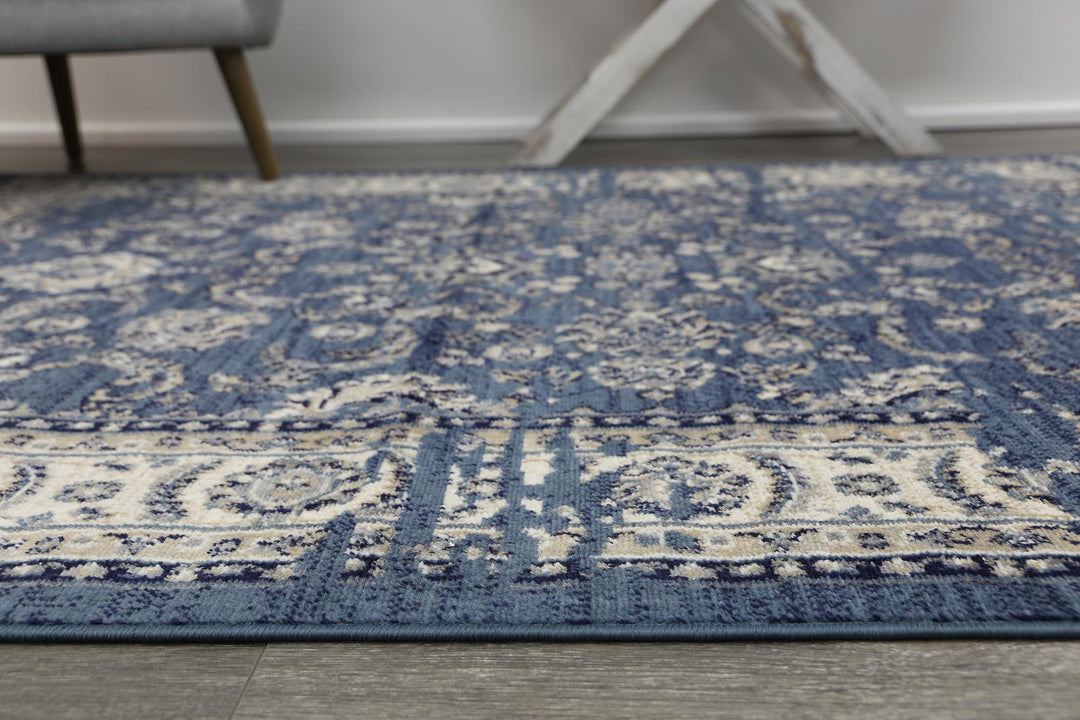 Arya Navy Blue Ziegler Distressed Traditional Ikat Rug