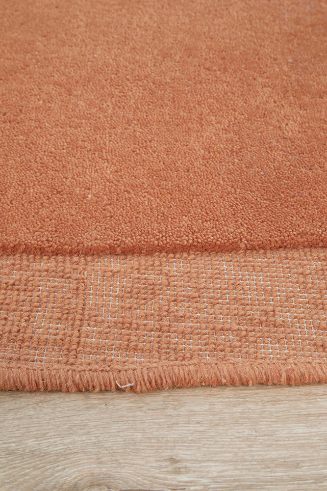 Cleo Organic Curved Shaped Orange Spice Rug