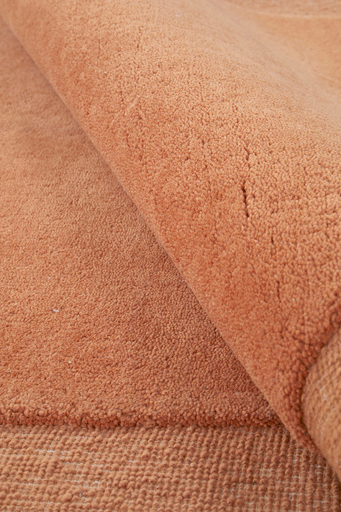 Cleo Organic Curved Shaped Orange Spice Rug
