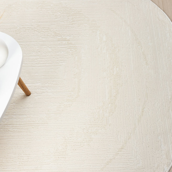 Luxe Distressed Border Warm Cream Round Rug