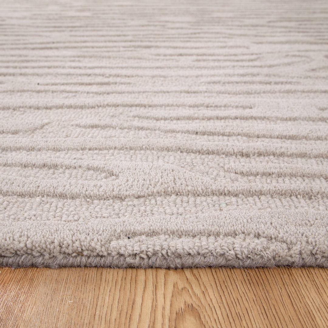 Les Nomades Sandstorm Beige Wool Rug